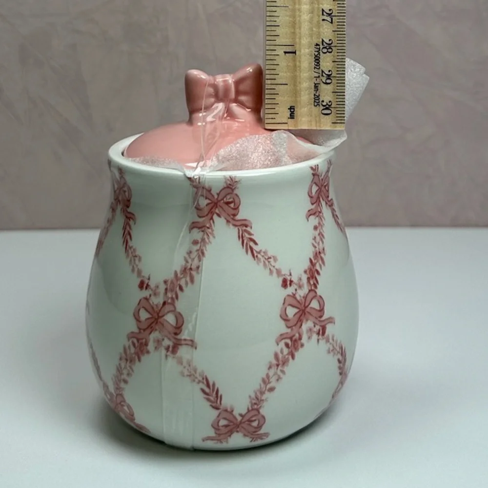 Elegant Pink and White Ceramic Sugar Bowl with Bow Accents